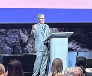 Justin Petrillo presenting to an audience