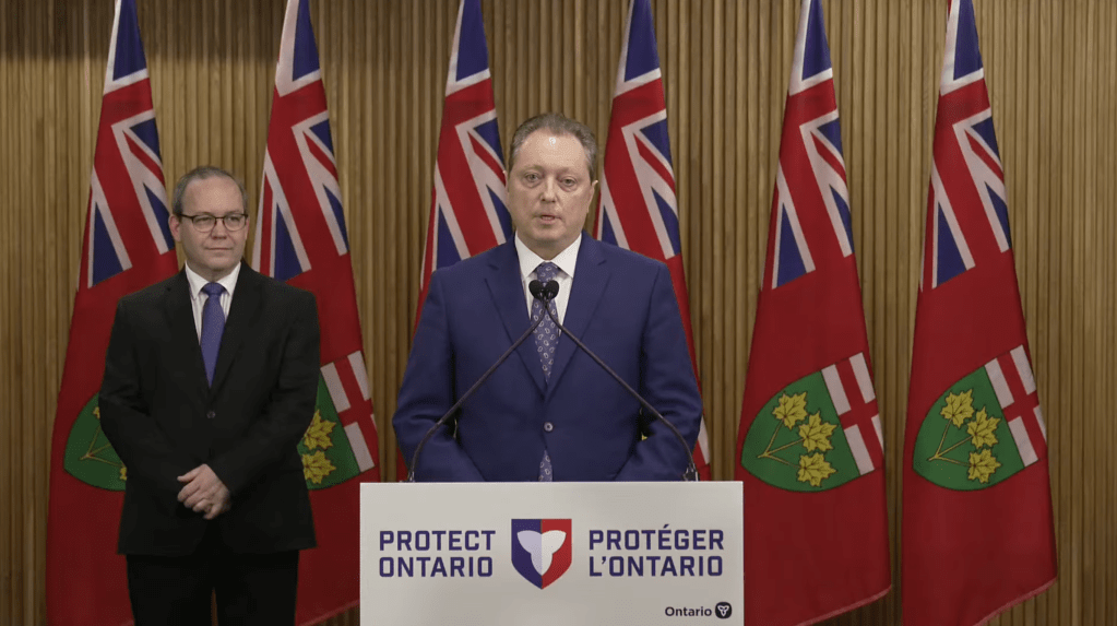 Stephen Crawford (centre), Minister of Public and Business Service Delivery and Procurement, was joined by Doug Downey (left), Attorney General to announce the changes on Friday