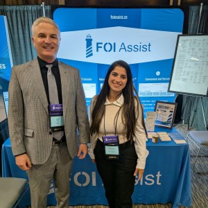 Justin and Sukhmani at the FOI Assist booth